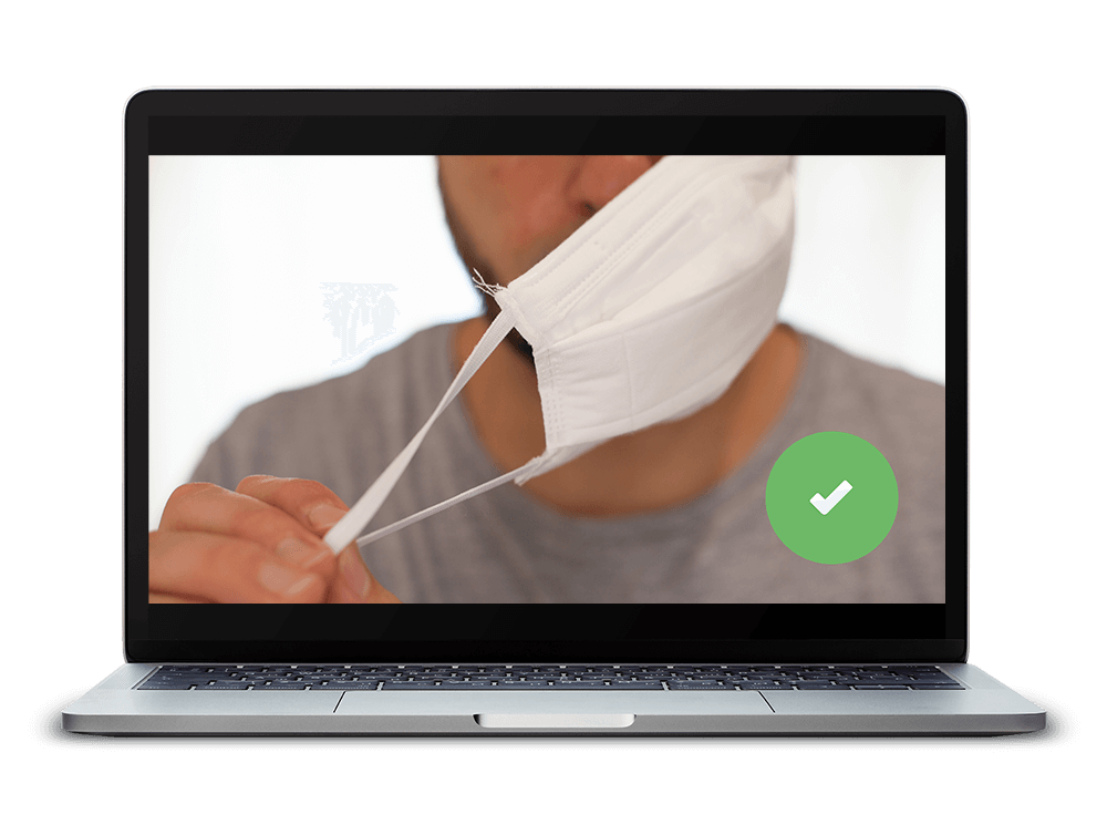 Laptop with image of a person wearing a facemask